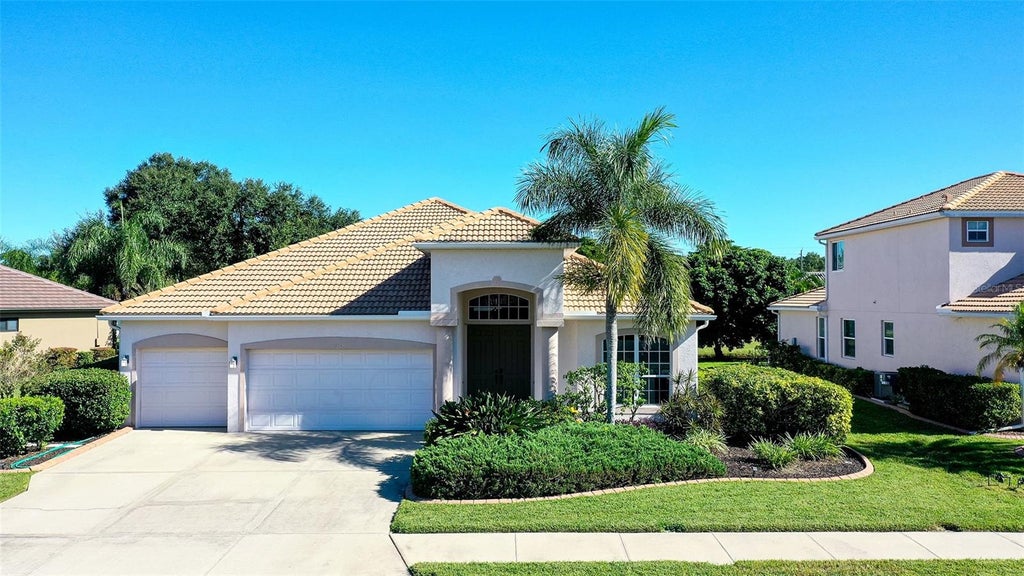 Photo of 1595 Pinyon Pine Drive, Sarasota, FL 34240 (MLS # A4710979)