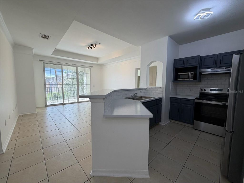 Photo of 3315 Parkchester Square Boulevard #301, Orlando, FL 32835 (MLS # O6354103)