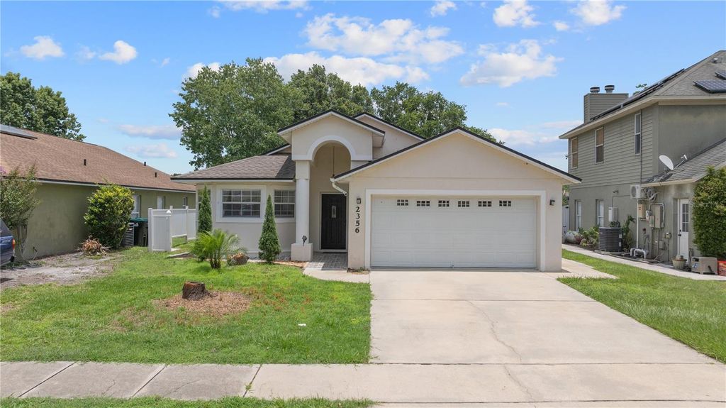 Photo of 2356 Island Club Way, Orlando, FL 32822 (MLS # O6376444)