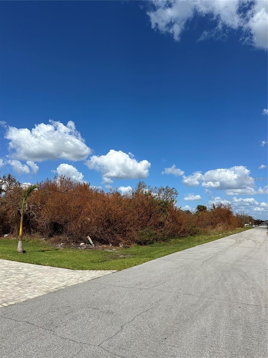 Exceptional opportunity to own a vacant lot in a desirable Rotonda Heights area of Rotonda West, Florida! This spacious home site offers the perfect canvas to build your dream home in a peaceful, well established neighborhood. Even better – the ADJACENT LOT is also available, featuring a concrete slab already in place, ideal for a buyer looking to take over and complete a custom project. Purchase BOTH properties for a combine estate-sized parcel, or develop them individually. Convenient to the Beautiful Beaches of Boca Grande, Englewood & Manasota Key, World-Class Fishing, Boating, many Golf Courses, Restaurants, Shopping & so much more.