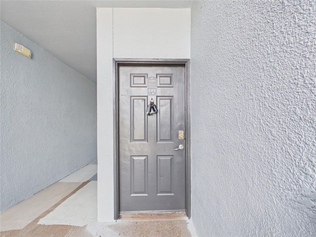 Photo of 16305 Enclave Village Drive #102, Tampa, FL 33647 (MLS # TB8488566)