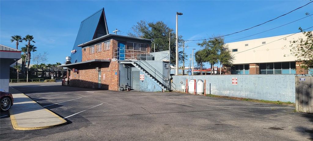 Photo of 747 W International Speedway Boulevard, Daytona Beach, FL 32114 (MLS # V4945219)