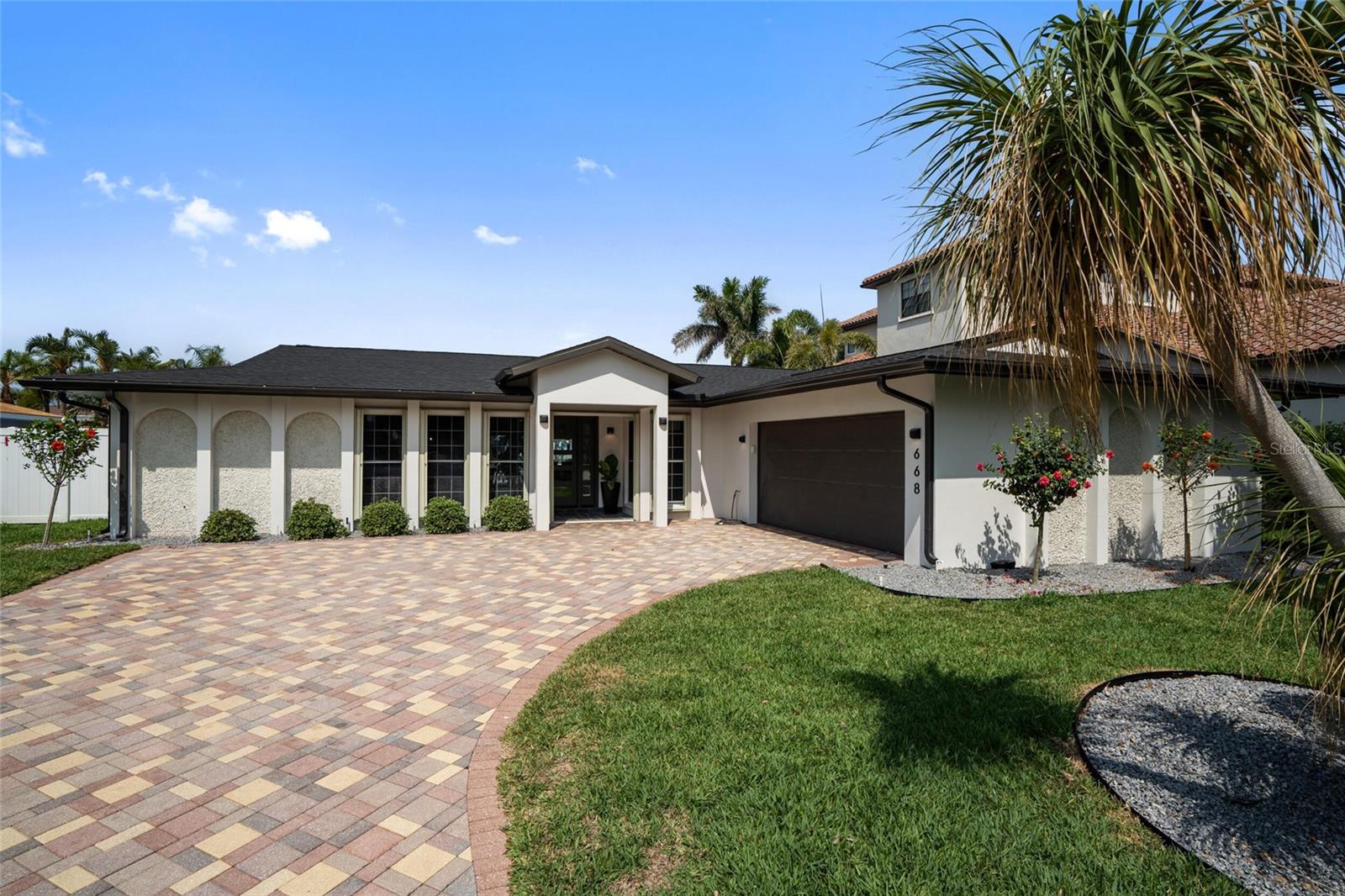 Stunning, Furnished Waterfront Home with Pool, Dock & Two Boat Lifts – Move-In Ready on Clearwater’s Desirable Island Estates Neighborhood!
This beautifully renovated 4-bedroom, 3-bathroom waterfront retreat in the Island Estates community offers resort-style living at its finest! Fully furnished and move-in ready, the home features a spacious open-concept layout, private pool with covered lanai and cabana, 2-car garage, and a private dock with two boat lifts—a dream set up for boating enthusiasts.
Step inside to an expansive, natural light-filled interior that was completely updated in 2025. Highlights include an oversized primary suite with pool and water views, new flooring, lighting and plumbing fixtures, complete with new furnishings and décor throughout. The chef’s kitchen boasts quartz countertops, a large center island with breakfast bar seating, and all-new stainless steel appliances. Nearly all the living space captures serene waterfront views.
Enjoy seamless indoor-outdoor living with the covered patio and pool area—perfect for entertaining or relaxing by the water.
Located just minutes from Clearwater Beach, dining, shopping, and attractions, this exceptional home delivers the perfect blend of comfort, luxury, and coastal convenience in one of Clearwater’s most sought-after neighborhoods.
Available now for long-term lease—don’t miss this opportunity!