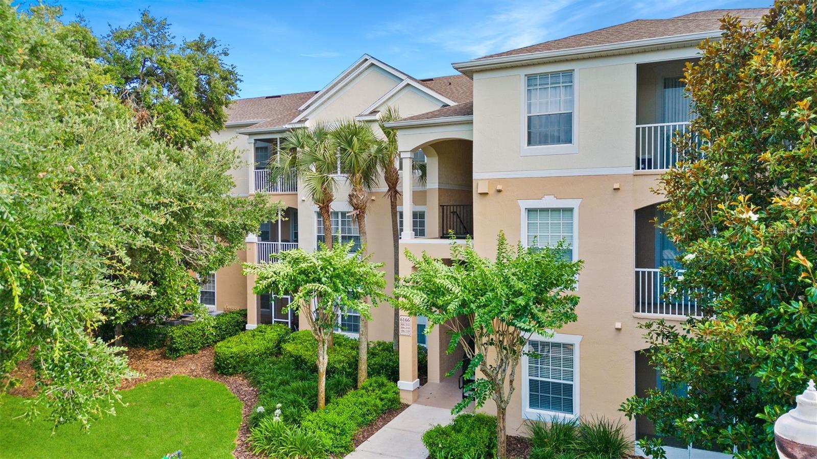 Live the low-maintenance MetroWest lifestyle in Horizons at Stonebridge Place, a sought-after gated condominium enclave known for its resort-style pool, well-equipped fitness center, and lush, walkable setting near everything Orlando. This bright 3-bedroom, 2-bath home with a split-bedroom design offers privacy and an easy, open flow: a generous great room for living and dining, tall ceilings that draw in natural light, and a screened balcony—perfect for coffee breaks, reading, or unwinding after the parks—with a serene tree-top outlook and a peek of the community pool just across the street.
The cook’s galley kitchen makes everyday prep effortless with long counters, abundant cabinet storage, and a pantry, plus stainless steel refrigerator, range & microwave and a handy arched pass-through/serving bar to the dining area. Durable laminate and tile flooring throughout—no carpet—keeps things clean and low-maintenance, while updated lighting and a sleek living-room ceiling fan add modern polish. The private primary suite features a spacious vanity and a tub/shower with sliding glass enclosure; two secondary bedrooms sit across the home and share a well-appointed hall bath.
Practical perks you’ll love: inside laundry with full-size washer & dryer INCLUDED, linen and utility storage, and covered, assigned parking space #12 near the building. Community amenities deliver the everyday convenience buyers want—sparkling pool, fitness center, sidewalks, mature trees, and professional management.
And the location is unbeatable: minutes to Universal Orlando, Valencia College West, the Mall at Millenia, Restaurant Row, and major employers, with quick connections to I-4, FL-408, and the Turnpike for downtown or the airport. Whether you’re right-sizing, buying your first home, or adding a well-located property to your portfolio (verify lease & pet rules with the association), this condo pairs comfort with convenience in one of Orlando’s most central corridors. Washer & dryer convey. Welcome home to Horizons at Stonebridge Place.