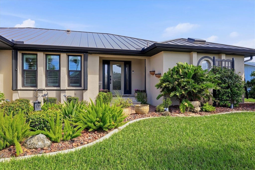 Photo of 1014 Via Tripoli, Punta Gorda, FL 33950 (MLS # C7531124)