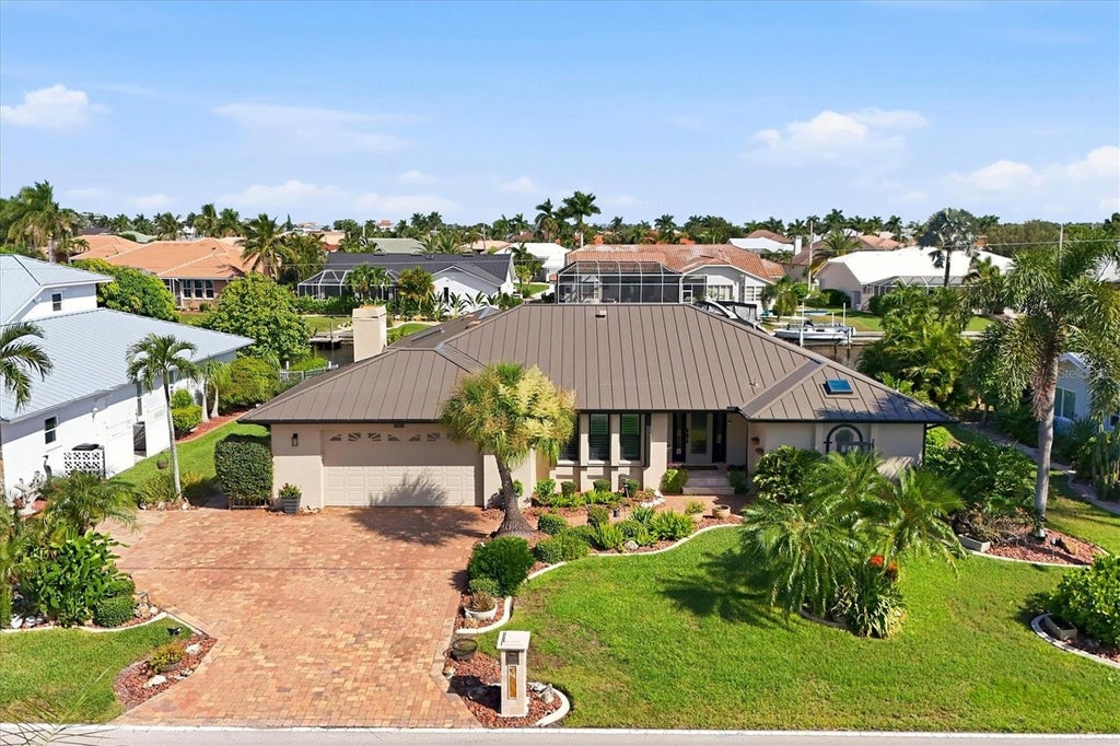 Photo of 1014 Via Tripoli, Punta Gorda, FL 33950 (MLS # C7531124)