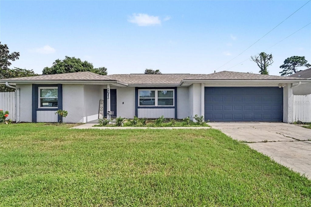 Photo of 1643 Pendleton Street, Deltona, FL 32725 (MLS # O6444827)