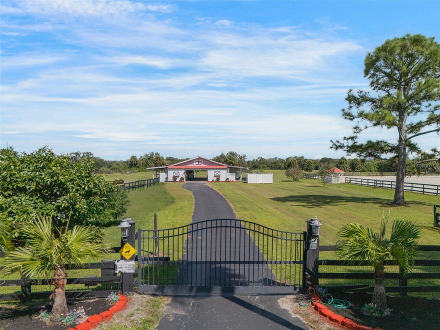 This premier equestrian facility offers the best of both worlds—an exceptional training and boarding setup just minutes from town, beaches, and showgrounds. Situated on two adjoining 5-acre parcels (10 acres total), the property is thoughtfully designed for horse enthusiasts and professionals alike.

The centerpiece is a well-appointed barn with 10 stalls (each with water, ventilation, rubber mats, and automatic misters), 3 wash stalls, an air-conditioned tack room, feed room, and office. The grounds feature an Olympic-size dressage arena with excellent footing and drainage, a lunging arena, hot walker, 8 watered paddocks, and durable fencing throughout—all in good repair. A slab with electric is in place for RV or trailer parking, making it convenient for travel and events.

Perfectly located just 5 minutes from Fox Lea Farms and approximately 15 minutes to Venice Island and its beaches, the property combines functionality with lifestyle. Whether you are looking to board, train, or simply enjoy your horses in a private setting, this facility is ready to meet your needs. Owner financing may be considered.