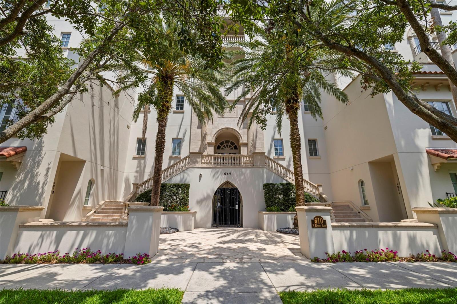 STEPS FROM HYDE PARK VILLAGE! A rare offering in Hyde Park, this two-story penthouse at The Valencia combines timeless European charm with modern luxury across 3,273 sq. ft., featuring 4 bedrooms, 3.5 baths, and an ultra-private 1,000 sq. ft. rooftop terrace with sweeping 360° views of Tampa Bay, the city skyline, and endless horizon. Located just steps from the heart of Hyde Park Village, this boutique Mediterranean-style building is tucked away on a quiet street at 610 S Rome Ave—offering unmatched walkability to Tampa’s best dining, shopping, and lifestyle destinations within a 2 minute walk. Inside, enjoy a sun-drenched primary suite with oversized windows and French doors capturing stunning sunrise and sunset views. The main living areas provide peaceful dual vistas—Swan Pond on one side and open bay views on the other—while the upstairs bedrooms overlook calming waterscapes and lush greenery. Rich wood floors, Sub-Zero & Wolf appliances, full smart home automation, and curated designer furnishings (offered furnished or unfurnished) complete the turnkey feel. Two deeded, covered parking spaces included. Drive just 5 minutes to Bayshore Boulevard, 10 minutes to International Plaza, and only 15 minutes to Tampa International Airport. Residences in The Valencia rarely come available. Emerge in city living in South Tampa's most favored neighborhood - Hyde Park.