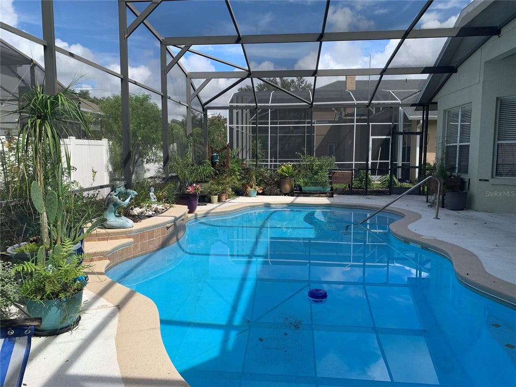 Photo of 6738 Vista Park Boulevard, Orlando, FL 32829 (MLS # O6440029)