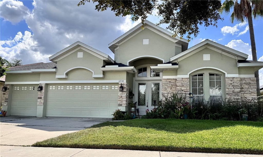 Photo of 6738 Vista Park Boulevard, Orlando, FL 32829 (MLS # O6440029)