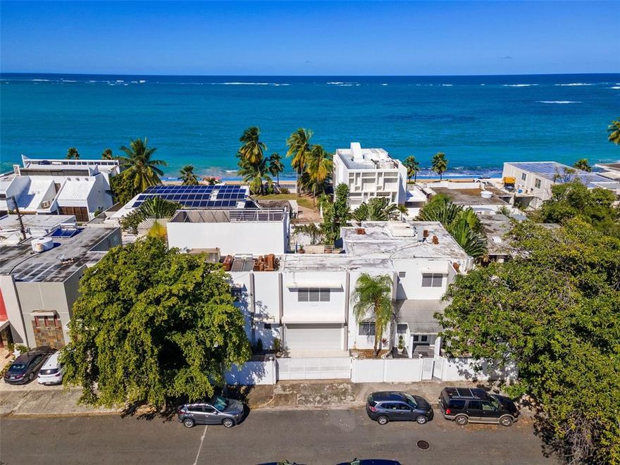 Once you step foot into this sprawling urban estate, you leave the noise and chaos of the city behind.  Located on a quiet, gorgeous, flowering tree-lined street, you're truly away from it all and yet still just a few steps from the beach.  Possibly the largest home in the Condado area, this exclusive residence lays out openly and has been recently completely remodeled, though there are a few details yet to complete: one of the master bathrooms, and the roof terrace area that features ocean views.  This is a special home that can easily host hundreds of people for an event, with a massive gym that can be converted to a wonderful TV lounge/movie room area or can be a third master suite.

Priced to sell and comes fully furnished.  Call for a showing today!