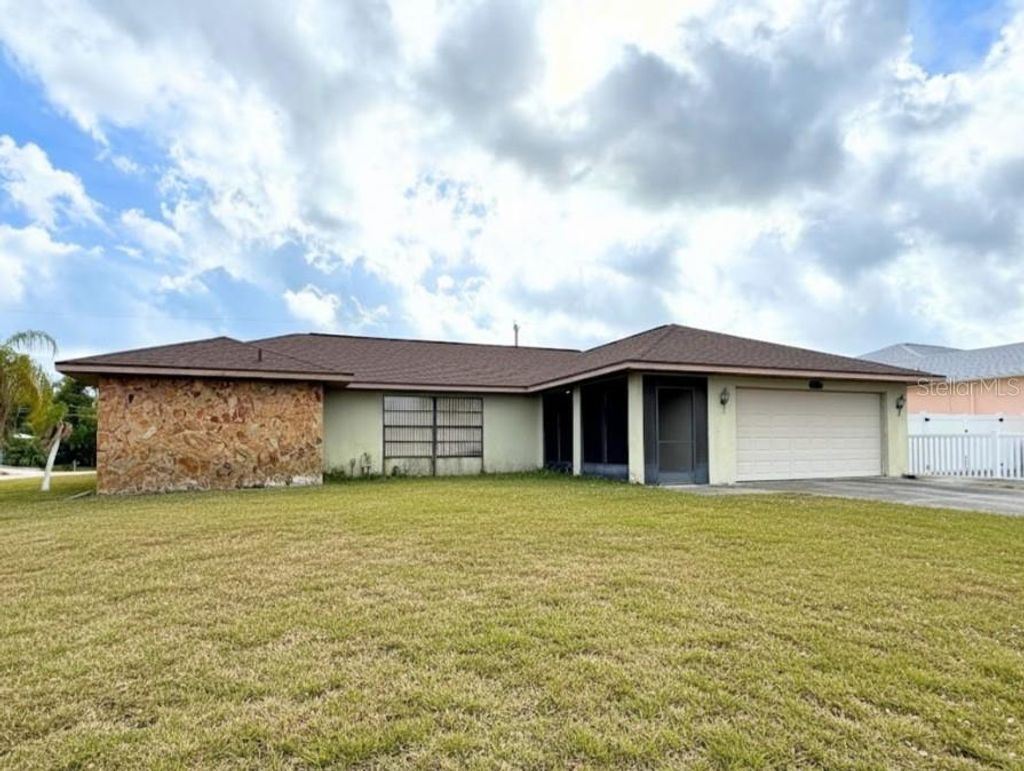 Photo of 18099 Petoskey Circle, Port Charlotte, FL 33948 (MLS # C7518374)