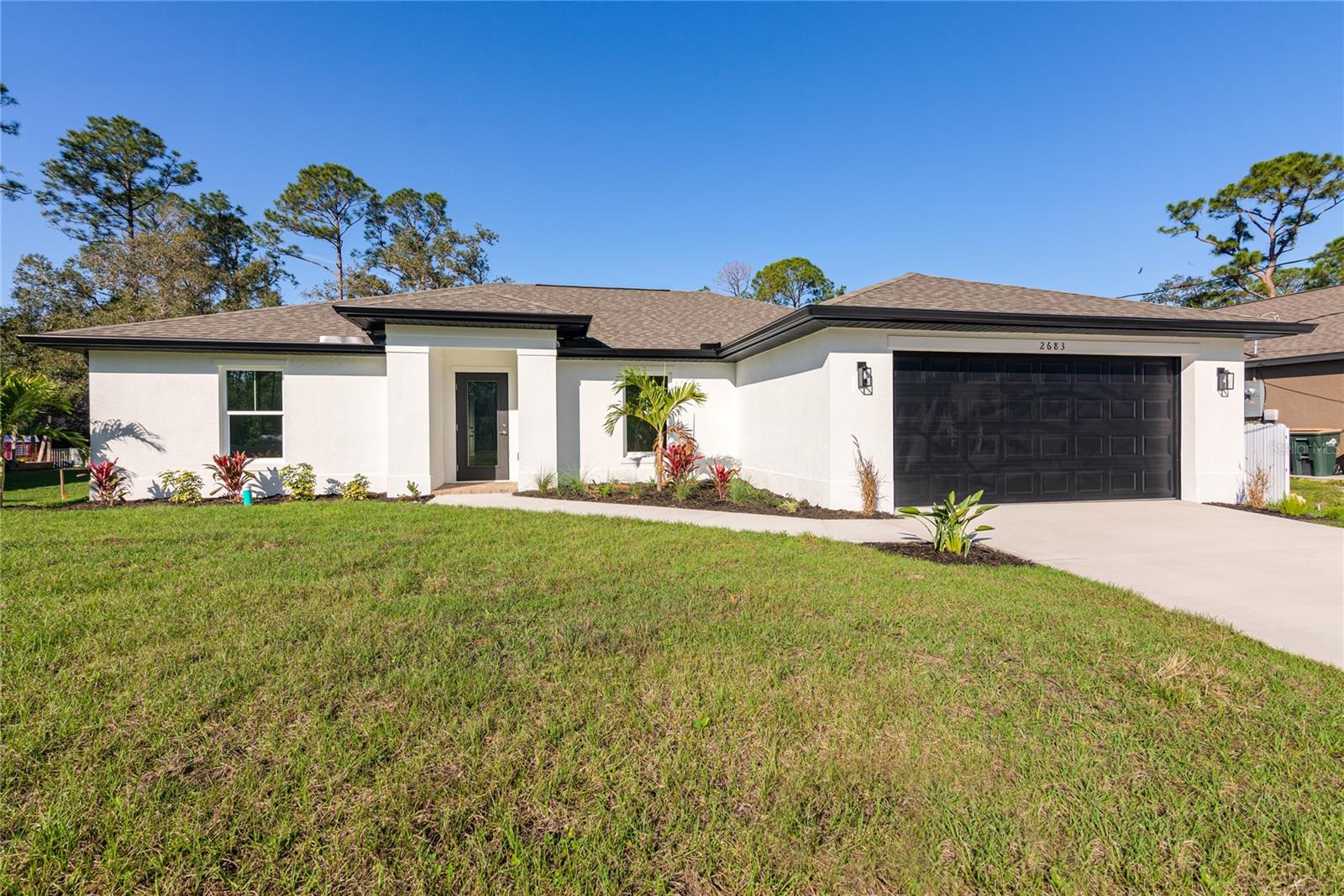 Recently Completed. Photos are from a completed Cypress Model with very similar specifications.This beautifully appointed Cypress floorplan features 1868 sq feet of living area with four bedrooms, a den and two full bathrooms. Kitchen features granite counters with a four inch backsplash, stainless appliances and shaker style cabinets. Home features wide colonial style baseboards and luxurious laminate throughout, exterior features include hurricane impact windows, concrete driveway, bahia sod and an upgraded front yard landscape package. Great starter home for the young family or ideal for a retiring family.