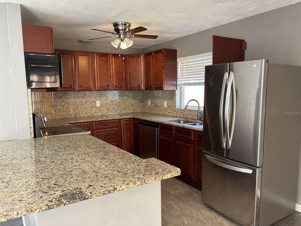 Photo of 4940 Shell Stream Boulevard, New Port Richey, FL 34652 (MLS # TB8501500)