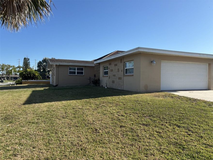 Beautiful UPDATED spacious corner home with two car garage plus bonus workshop or storage area. Features include stainless steel appliances, updated
kitchen cabinets, counter tops, bathroom vanity and shower. This open floor plan home has updated floors thru out and NO CARPET. There is
plenty of parking with the oversized garage and driveway space. The property has a fenced in back yard for privacy or for letting your pets run
and explore. Great location, close to shopping, restaurants, entertainment and much more. This home will not last so call for your showing today.