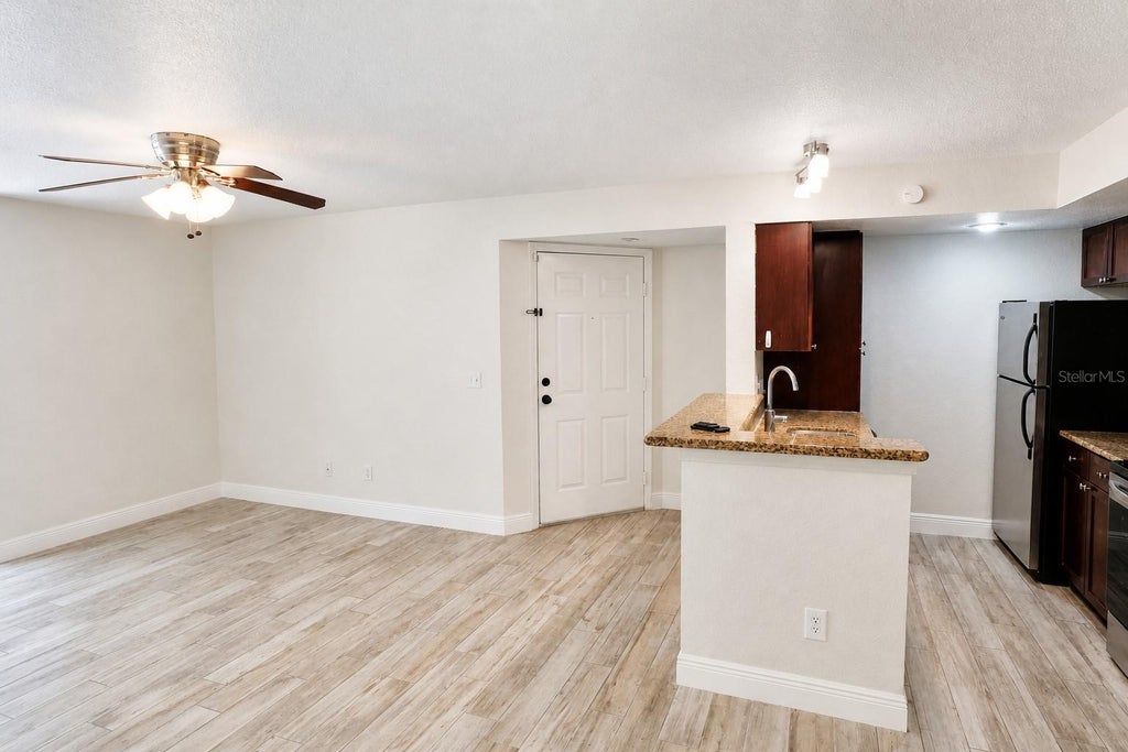 Photo of 5156 Conroy Road #16, Orlando, FL 32811 (MLS # O6433879)