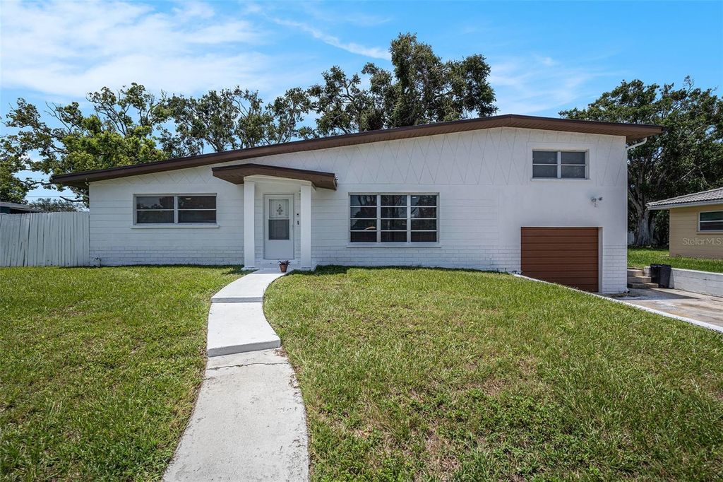 Photo of 11830 86th Avenue, Seminole, FL 33772 (MLS # TB8405055)