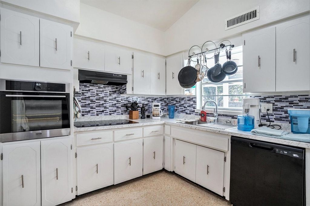 Photo of 11830 86th Avenue, Seminole, FL 33772 (MLS # TB8405055)