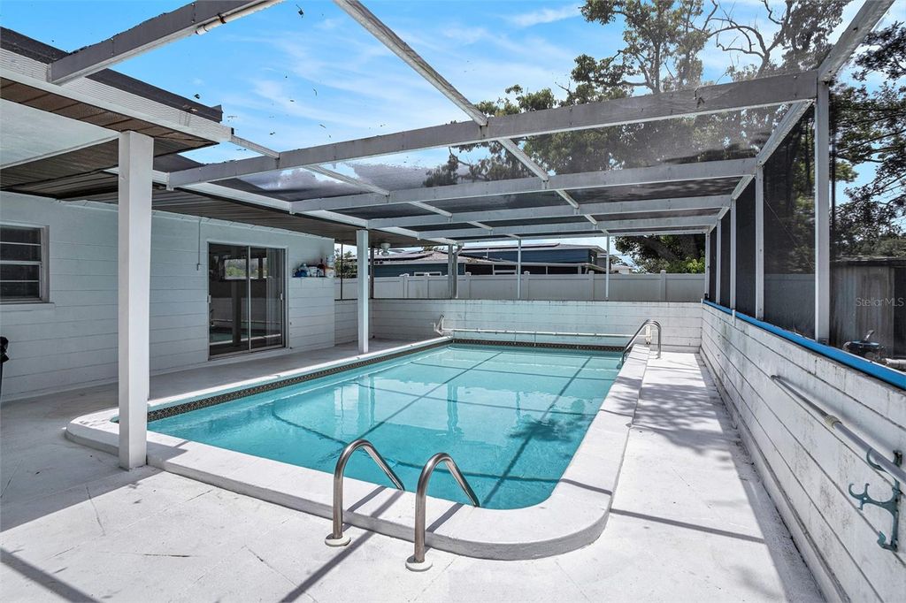 Photo of 11830 86th Avenue, Seminole, FL 33772 (MLS # TB8405055)