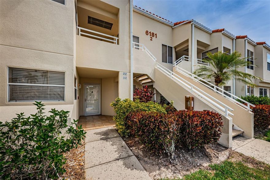 Welcome to coastal living at its finest in the highly desirable Verde Vista North Condo community! This beautifully maintained GROUND FLOOR 2-bedroom, 2-bath condo offers stunning golf course views from the private patio, spacious great room, and relaxing primary suite — all located in a NON-FLOOD ZONE (X500) for added peace of mind and value. Featuring an open-concept floor plan, this light and bright condo seamlessly blends comfort and functionality. The spacious great room flows effortlessly into the dining area and eat-in kitchen complete with stainless steel appliances, making it perfect for entertaining or everyday Florida living. Beautiful tile and wood vinyl flooring throughout add warmth and style to the home. The primary suite features peaceful golf course views, a large walk-in closet, and a beautifully designed bathroom with dual sinks. The second bedroom includes its own private en-suite, ideal for guests or flexible living arrangements. A dedicated study/work area provides additional space for a home office or reading nook. Additional upgrades include a BRAND-NEW washer and dryer conveniently located inside the unit, plenty of storage, and abundant parking for residents and guests. The affordable monthly HOA fee is only $644.37 and covers Cable TV, Internet, Water, Sewer, Trash, Insurance, Exterior Maintenance, Grounds Maintenance, Community Pool, Pool Maintenance, Security, Escrow Reserves Fund, and On-Site Management — making ownership simple and convenient. Enjoy resort-style amenities including: • Heated pool & hot tub • Clubhouse • Bike rack area • Car wash station • Beautifully maintained grounds. Perfectly located just steps to the beach and minutes from the iconic The Don CeSar, shopping, restaurants, and entertainment, this condo offers the ultimate beach lifestyle with convenience and charm. Excellent opportunity for full-time living, seasonal use, or investment property — this income-producing unit is investor-friendly and move-in ready. Whether you’re searching for the perfect beach-area primary residence, winter retreat, or income-producing investment property, this rare ground-floor opportunity checks all the boxes. Schedule your private showing today and experience the Florida lifestyle buyers dream about before this coastal gem is gone!