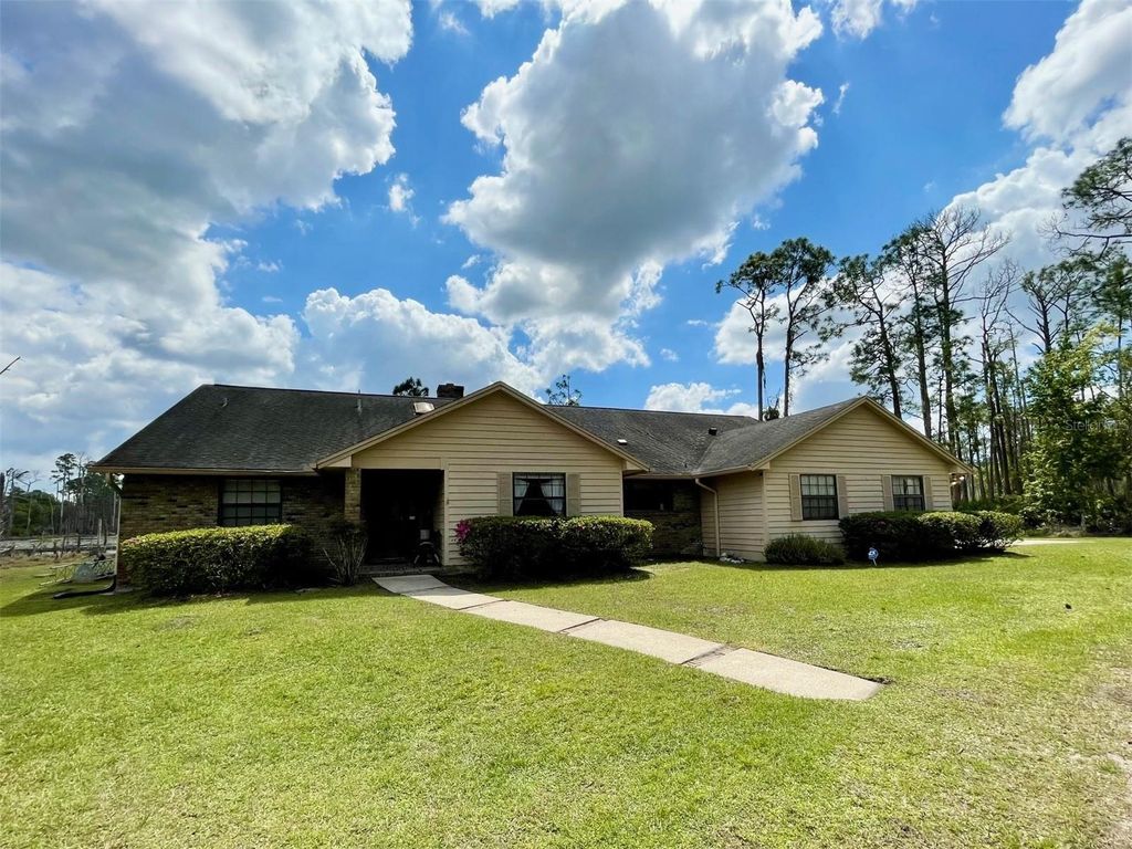 Photo of 349 Seminole Woods Blvd, Geneva, FL 32732 (MLS # O6394362)