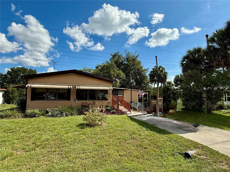 PRICE ADJUSTMENT,  BRING OFFERS SELLER IS READY TO SELL!!  Welcome to this beautifully maintained 2-bedroom, 2-bath home, offering over 1,500 square feet of comfortable, easy living in one of Central Florida’s most vibrant active lifestyle communities. With a new AC installed in 2024, this home is move-in ready and thoughtfully designed for both relaxation and entertaining.

Inside, you'll find an open floor plan that flows seamlessly into a light-filled Florida room—the perfect spot to enjoy a morning cup of coffee, read a good book, or host family and friends. The home offers abundant storage throughout, including two exterior sheds that provide extra space for hobbies, tools, or seasonal decor.

Set on a lot with no rear neighbors, you’ll appreciate the privacy and tranquility this home offers, along with the convenience of being just a short walk to the community dog park.

Living here means having access to an incredible array of amenities, including a championship golf course, on-site restaurant with dancing and live entertainment, state-of-the-art fitness center, pickleball and tennis courts, billiards, a woodworking shop, craft room, and so much more. For nature lovers, the community also features beautiful walking and nature trails, ideal for peaceful strolls or daily exercise. Just minutes away, Lake Okahumpka offers kayaking, fishing, and stunning natural scenery.

Whether you're looking to stay active, connect with new friends, or unwind in a serene setting, this home delivers the perfect blend of comfort, community, and lifestyle.

This Home is a Savoie!! Call your agent today for more info!!

Don’t miss your chance to experience it all—schedule your private tour today!