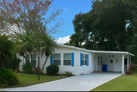 Photo of 304 Portside Lane, Edgewater, FL 32141 (MLS # V4945749)