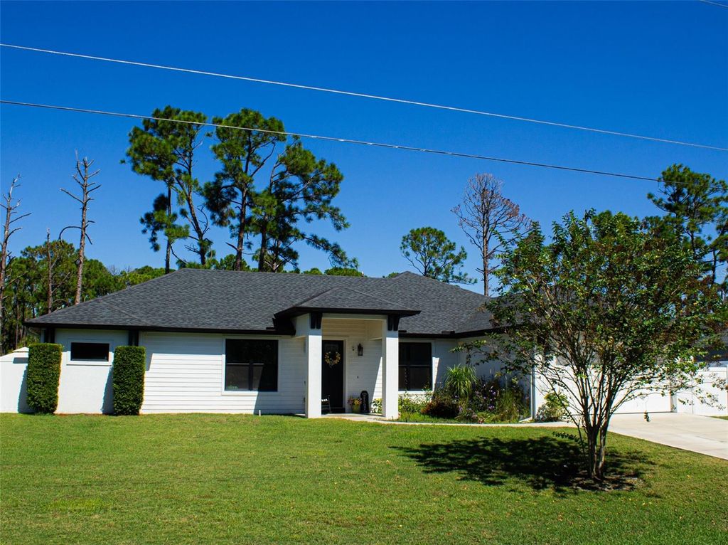 Photo of 12078 Chapman Ave, Port Charlotte, FL 33953 (MLS # A4661860)