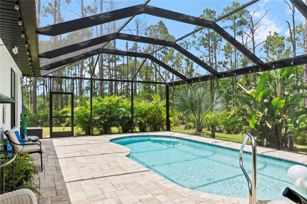 Photo of 12078 Chapman Ave, Port Charlotte, FL 33953 (MLS # A4661860)