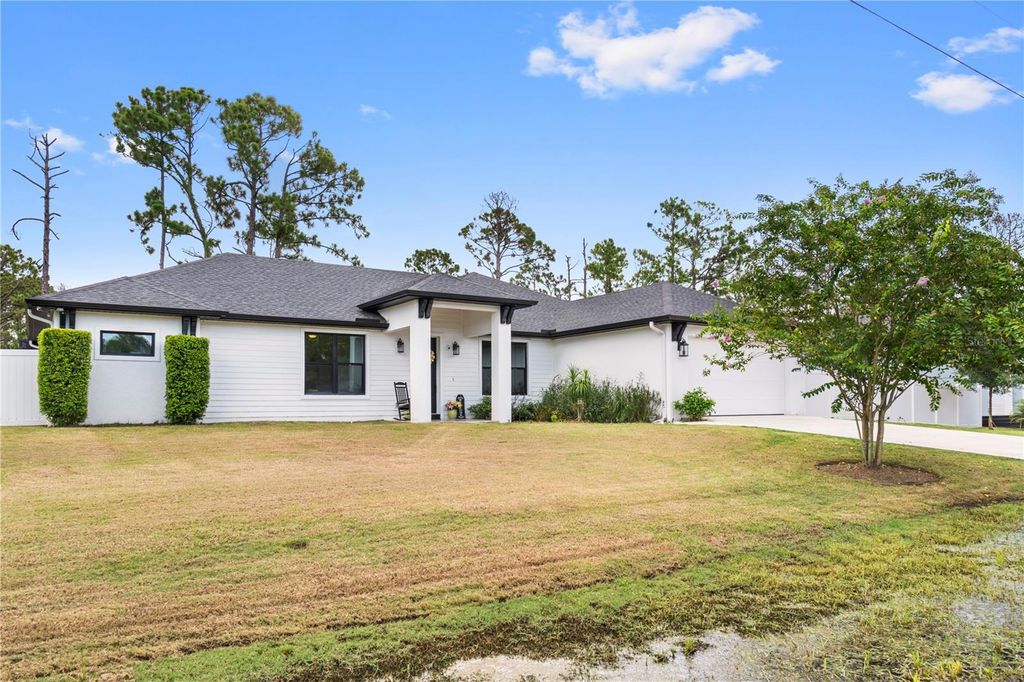 Photo of 12078 Chapman Ave, Port Charlotte, FL 33953 (MLS # A4661860)