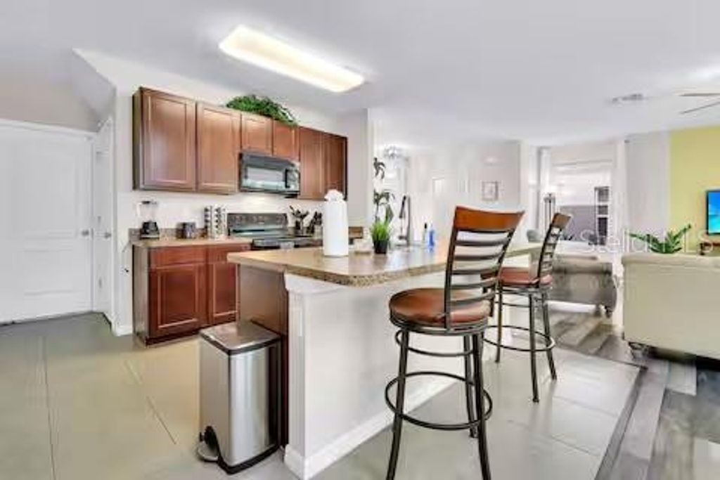 Photo of 10108 Hawk Storm Avenue, Tampa, FL 33610 (MLS # TB8494620)