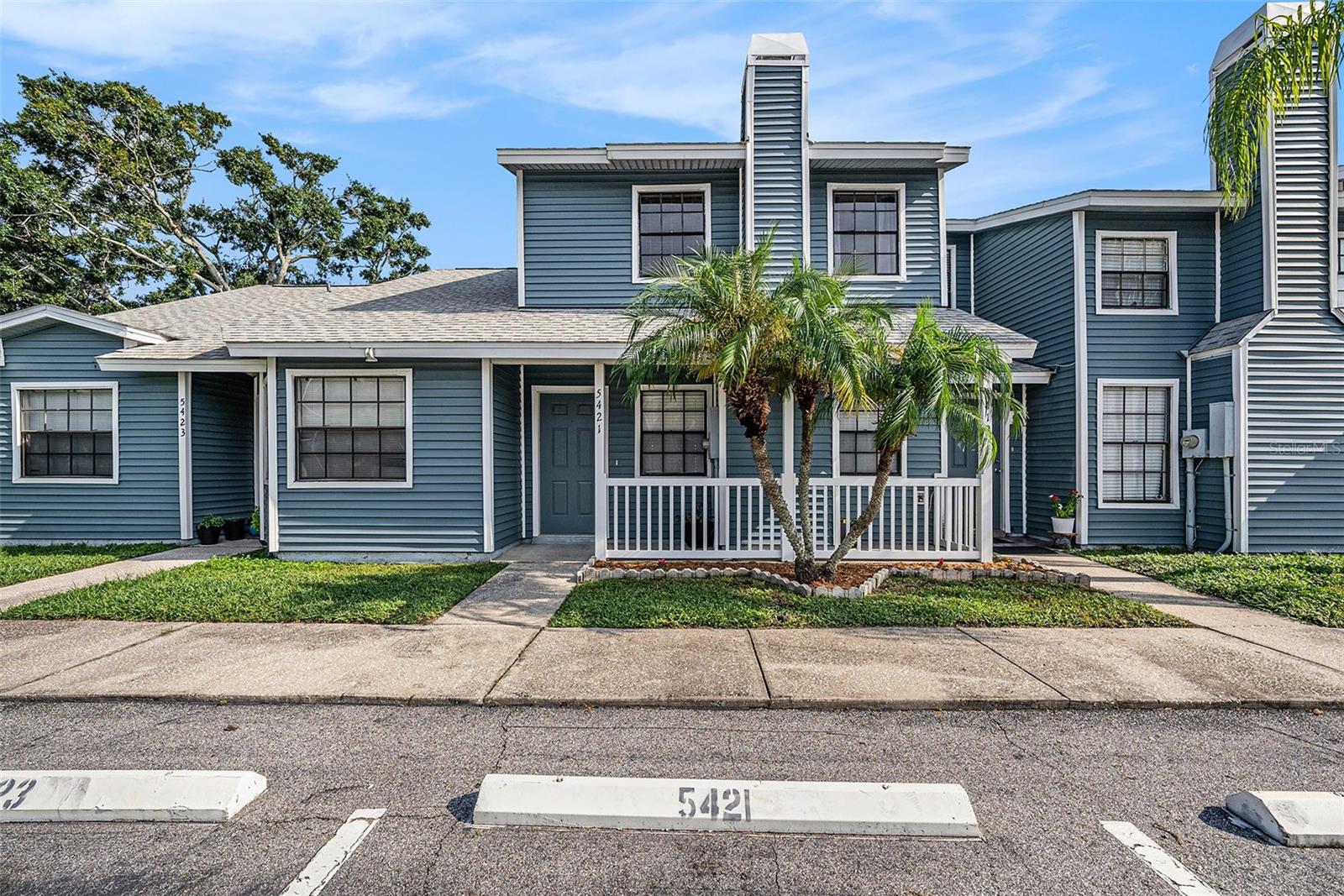 Beautiful three bedroom, two and a half bath townhouse with water view in Greater Carrollwood, located in Hampton Park Townhomes. This home offers a large living room/dining room combination and the kitchen features plenty of cabinet space, stainless-steel appliances, pantry, breakfast bar and eat-in-kitchen. The half bath is downstairs with bedrooms upstairs in a split-floor plan. Ceramic tile is in the kitchen and bathrooms with hardwood in the living room and carpeted bedrooms. Additionally, there is a large closet for storage and a utility room for the washer and dryer. Your screened and covered back porch is perfect for enjoying the water view. This community has a large pool for your enjoyment. Across the street from this community is Hampton Park which includes a playground as well as tennis and basketball courts. Furnishings are optional. All appliances are included. NOTE: Seller is offering a $1,500 credit at closing for new carpeting. LOCATION: Good Schools, Publix (5 mins), Walmart (5 mins), USF (20 mins), Tampa International Airport (20 mins), Downtown Tampa (30 mins), and close to all the restaurants, shopping and entertainment for which the Tampa Bay area is famous. Schedule your showing today!