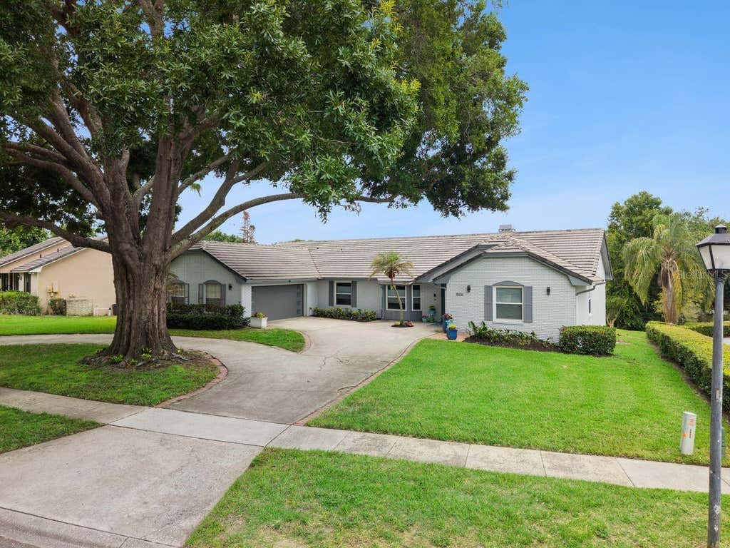Photo of 8606 Lost Cove Drive, Orlando, FL 32819 (MLS # O6415719)