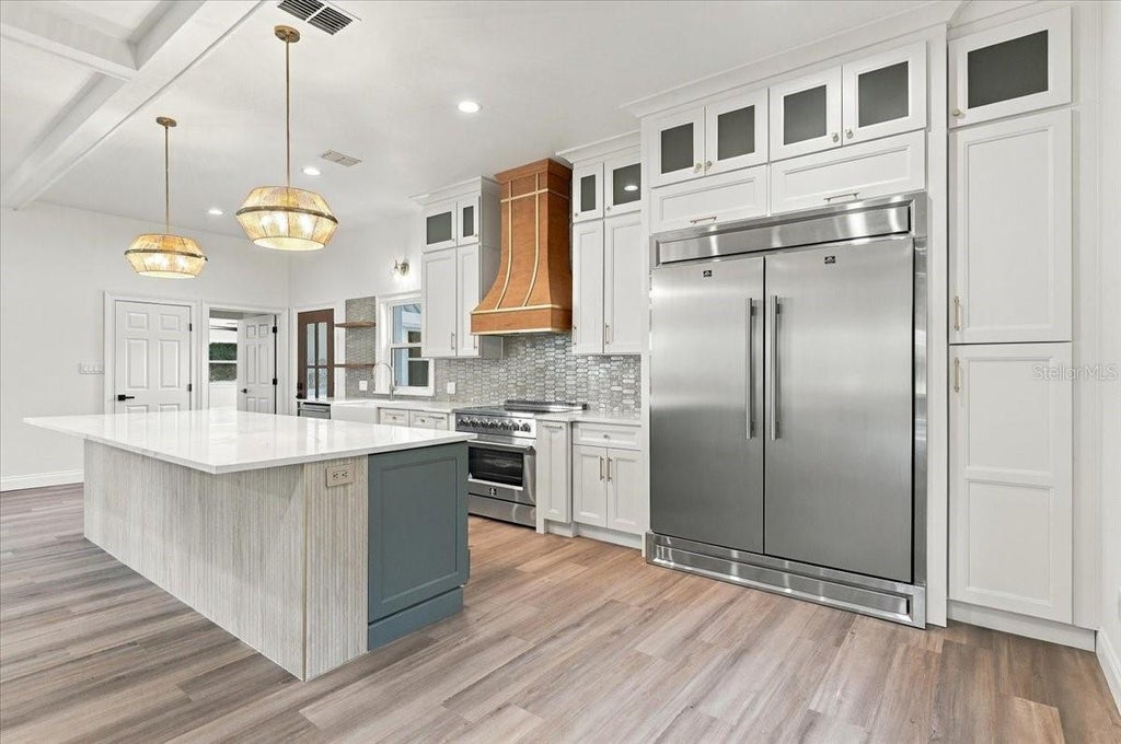 Photo of 13 Bogey Drive, Winter Haven, FL 33881 (MLS # P4940054)