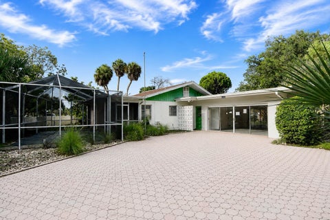 Photo of 7124 Jasmin Drive, New Port Richey, FL 34652 (MLS # W7888276)