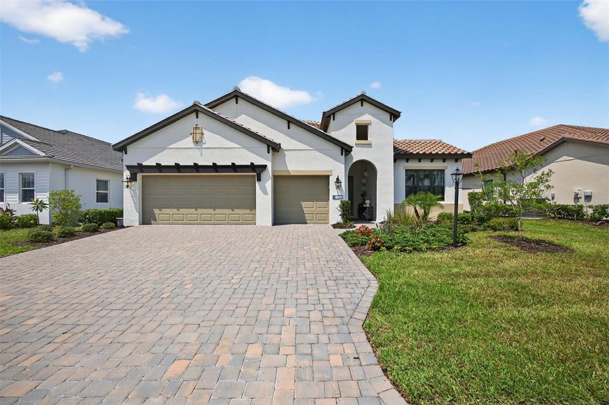 BEST PRICED 4 BEDROOM IN INDIGO! Why wait to build when you can own this immaculate 2022-built home in the highly sought-after gated community of Indigo at Lakewood Ranch? This Silver Sky II model by Neal Communities sits on a premium preserve lot and features 4 spacious bedrooms, 3 full bathrooms, a versatile den/leisure room, and a 3-car garage.

Enjoy peace of mind with hurricane-impact windows and doors, along with high-quality finishes throughout. The bright, open-concept kitchen showcases stainless steel GE appliances, an Electrolux gas cooktop, large stainless steel sink, large island, and walk-in pantry—perfect for entertaining or everyday living.

Throughout the home’s 2,682 sq. ft. of heated living space (3,687 total sq. ft.), you’ll find 24x24 marble-style porcelain tile, soaring 10-foot ceilings, elegant 8-foot interior doors, and recessed lighting in every room. All three bathrooms are beautifully upgraded with frameless glass shower enclosures and floor-to-ceiling tile. The laundry room includes a GE energy-efficient washer and dryer with smart technology, and houses the high-efficiency 16 SEER Trane A/C unit.

Step outside to the screened lanai, overlooking a serene and private preserve. The outdoor area is pre-plumbed for a natural gas kitchen, with plenty of space to add a pool—though you may not need one, thanks to Indigo’s resort-style amenities. Residents enjoy a tropical pool and spa, clubhouse, fitness center, aerobics room, bocce, pickleball courts, and more, all in a maintenance-free setting.

Located just off SR-70 and SR-64, Indigo offers easy access to shopping, dining, top-rated schools, medical facilities, and world-famous Gulf Coast beaches.

Don’t miss your chance to own this incredible home on Deep Blue Place—schedule your private showing today! Floor plan available upon request.