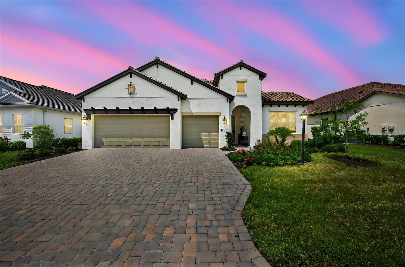 Why wait to build when you can own this immaculate 2022-built home in the highly sought-after gated community of Indigo at Lakewood Ranch? This Silver Sky II model by Neal Communities sits on a premium preserve lot and features 4 spacious bedrooms, 3 full bathrooms, a versatile den/leisure room, and a 3-car garage.
Enjoy peace of mind with hurricane-impact windows and doors, along with high-quality finishes throughout. The bright, open-concept kitchen showcases stainless steel GE appliances, an Electrolux gas cooktop, large stainless steel sink, large island, and walk-in pantry—perfect for entertaining or everyday living.
Throughout the home’s 2,682 sq. ft. of heated living space (3,687 total sq. ft.), you’ll find 24x24 marble-style porcelain tile, soaring 10-foot ceilings, elegant 8-foot interior doors, and recessed lighting in every room. All three bathrooms are beautifully upgraded with frameless glass shower enclosures and floor-to-ceiling tile. The laundry room includes a GE energy-efficient washer and dryer with smart technology, and houses the high-efficiency 16 SEER Trane A/C unit.
Step outside to the screened lanai, overlooking a serene and private preserve. The outdoor area is pre-plumbed for a natural gas kitchen, with plenty of space to add a pool—though you may not need one, thanks to Indigo’s resort-style amenities. Residents enjoy a tropical pool and spa, clubhouse, fitness center, aerobics room, bocce, pickleball courts, and more, all in a maintenance-free setting.
Located just off SR-70 and SR-64, Indigo offers easy access to shopping, dining, top-rated schools, medical facilities, and world-famous Gulf Coast beaches.
Don’t miss your chance to own this incredible home on Deep Blue Place—schedule your private showing today! Floor plan available upon request.
