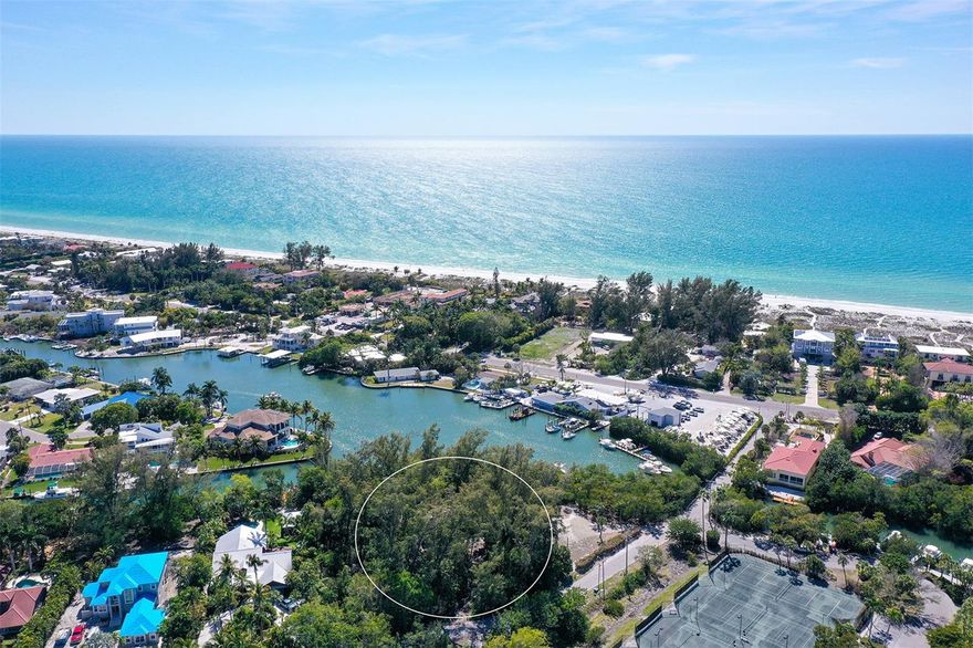 Double lot on a wide canal that is 1.06 acres  with 200 ft of  protected waterfront located on Dream Island Road Longboat Key. This tranquil waterfront retreat is ready for your new home plus the possibility of two canal front homes. For the boating enthusiast, the intracoastal waterway is easily accessible with no bridges. This oasis is a waterfront paradise. There is a 4 bedroom 3 bath home on the property that can be updated for waterfront living. This prime location is within walking or biking distance to the gorgeous Gulf of Mexico and beautiful Longboat Key beach. Great restaurants, St. Armands Circle and Sarasota are minutes away. An exceptional opportunity to own a waterfront property on Longboat Key! Celebrate the natural beauty of Florida as it was truly meant to be experienced in this enchanting coastal estate.