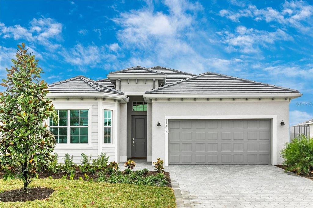 Photo of 12736 Tulum Loop, Venice, FL 34293 (MLS # N6143898)