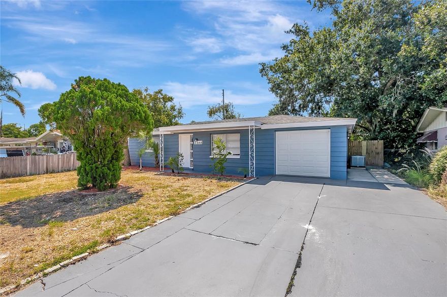 Tastefully REMODELED DREAM HOME!!!!! 3 bedroom 2 baths 1 car garage, Open floor plan. Many NEW update!   NEW ROOF AND NEW AC IN 2025!!!!  The cook in your house will appreciate the spacious kitchen featuring recently updated All Wood cabinets with custom counter tops, and brand new appliance package. Custom 18" ceramic tile flooring throughout. Both Bathrooms have been recently updated with new custom vanities and counters, updated lighting and plumbing fixtures as well as custom ceramic tile shower surround. The open floor plan makes this home perfect for entertaining. Walk out back to your to your private yard. Large lot on a quiet street. Hurry, this will not last long!!!!!!!