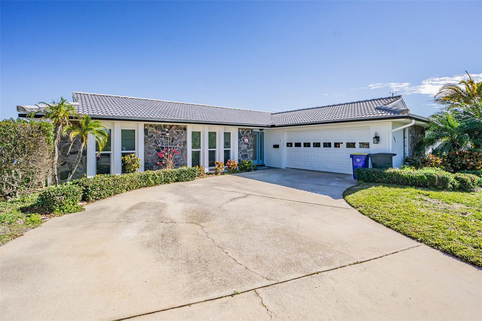 A Boating Enthusiast’s Dream located on one of the widest and deep-water canals in Gulf Harbors! This renovated waterfront residence overlooks a protected wide and deep-water canal that provides open access to the Gulf of America . Situated in the sought-after FloraMar subdivision within the Gulf Harbors community, this 1,912 sq ft, block-constructed home. 3-bedroom split floor plan plus a den, 2 baths, and a 2-car garage. The seller’s pride of ownership and attention to detail are evident from the moment you arrive. From the landscaping to the oversized dock and boat lift, and screened patio for peaceful sunrises and sunset cookouts and entertaining. Step through the front entryway and the open floor plan and are welcomed to the wide saltwater canal! The expansive light & airy open living concept, The heart of the home—the kitchen—features recessed lighting, an oversized counter-height bar island with ample cabinet storage, granite countertops, and solid wood cabinets. The spacious living room includes a dining area that offers extensive natural light from the wall, sliding glass doors, and a second seating area. On a cool autumn evening, the excellent cross ventilation of the gulf breeze via the screen enclosed front door and open sliders brings the living area and pool deck together as one space. The split floor plan’s primary bedroom plus a den boasts multiple windows, large closets, and an ensuite bath with a glass-enclosed shower and dual sink vanity. The second and third bedrooms also has built-in closets, and plenty of natural light. In addition, Gulf Harbors is a golf cart friendly community that includes the opportunity to obtain a membership to their beautiful private beach. With all this home has the boater’s dream of a backyard
Home also has access to Gulf harbors private beach