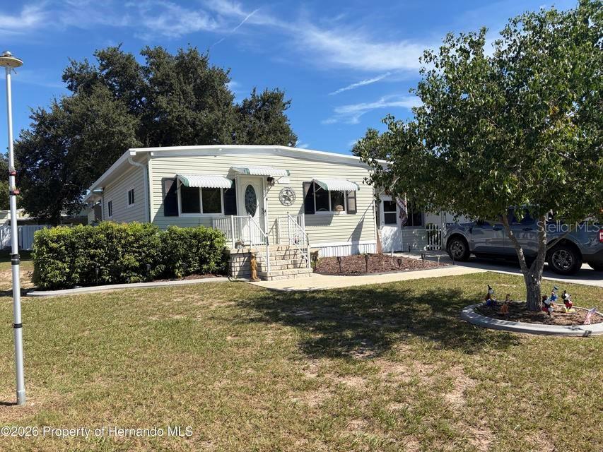 Photo of 14295 Sandhurst Street, Brooksville, FL 34613 (MLS # W7890003)