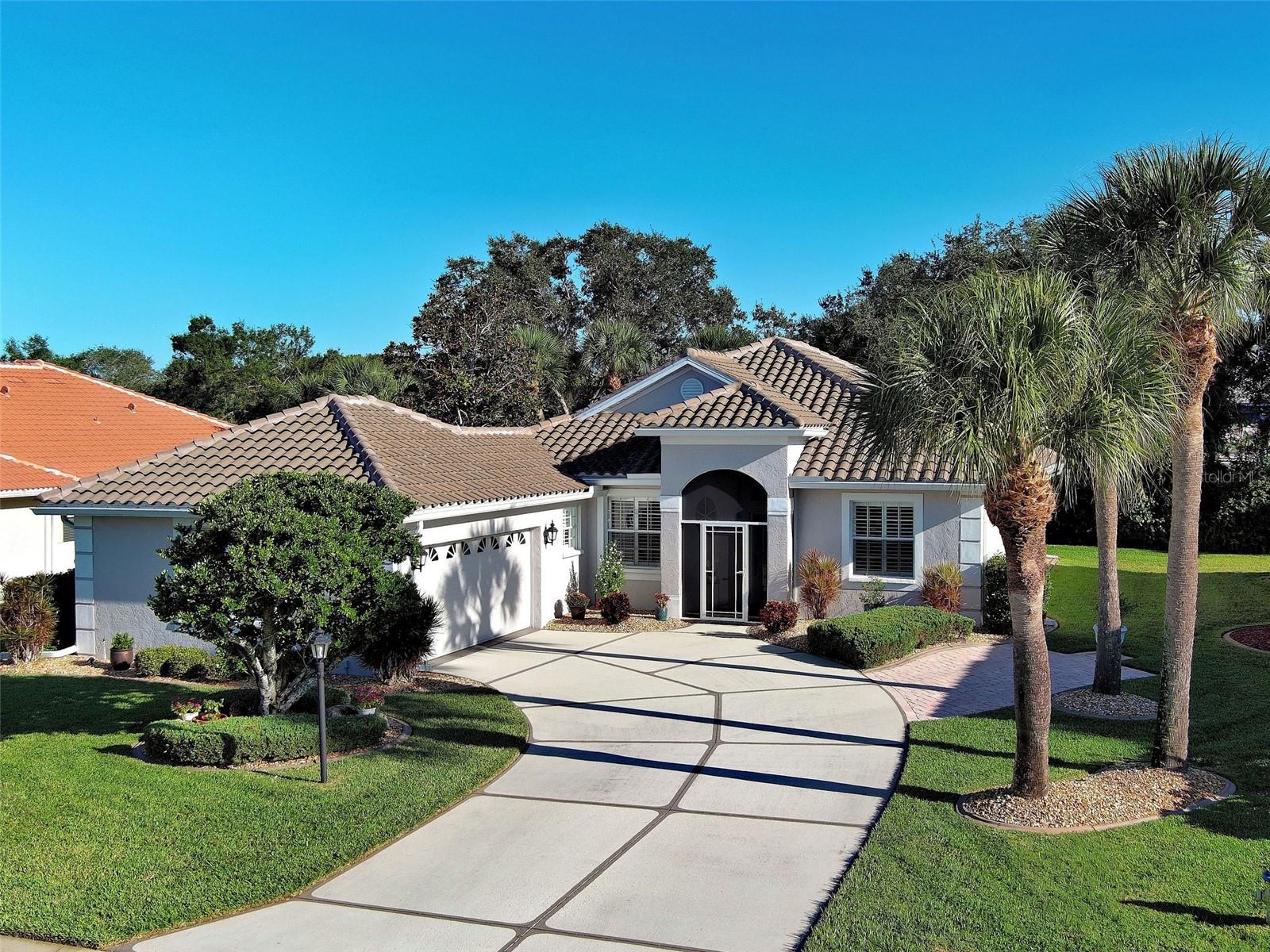 Welcome to Hidden Lakes Club, one of Venice’s most desirable gated communities, where comfort, style, and Florida living come together effortlessly. This 2-bedroom, 2-bath home PLUS a den/office is bright, open, and filled with natural light. From the moment you step through the screened front porch, you’ll feel the spacious flow, ceramic tile floors, and crown molding throughout that give this home a touch of refined elegance.
Enjoy peace of mind with a TILE ROOF (2023) and AC (2020) - you can move right in and start living the good life. The kitchen offers generous counter space, plenty of cabinets, and a sunny eat-in nook, while the dining area transitions easily from intimate dinners to entertaining friends.
The primary suite is your private retreat with two walk-in closets, an en suite bath, and direct access to the lanai - the perfect spot for morning coffee overlooking the serene pond view. The second bedroom features crown molding and luxury vinyl flooring, while the flexible den/office invites your imagination: a quiet workspace, cozy reading nook, creative studio, or cheerful playroom - the possibilities are endless!
Relax or entertain year-round in the extended lanai with sliding windows, seamlessly blending indoor and outdoor living. The side patio with pavers is perfect for grilling, lounging, or enjoying your own outdoor garden oasis. Surrounded by beautiful landscaping, this home is just a short stroll to the clubhouse, resort-style pool, hot tub, fitness center, and tennis court.
You’ll love the location - close to the new Sarasota Memorial Hospital in Venice, with easy access to I-75 for quick travel to SRQ, TPA, or RSW airports. And of course, you’re minutes from white-sand beaches, boating, fishing, golf courses, spring training baseball, boutique shopping, and Venice’s amazing restaurants. From sunset walks on the beach to dinner on the island, every day here feels like vacation.
Move-in ready, meticulously maintained, and filled with upgrades - this home truly has it all. Schedule your private showing today and make Hidden Lakes Club your next chapter in Florida living!