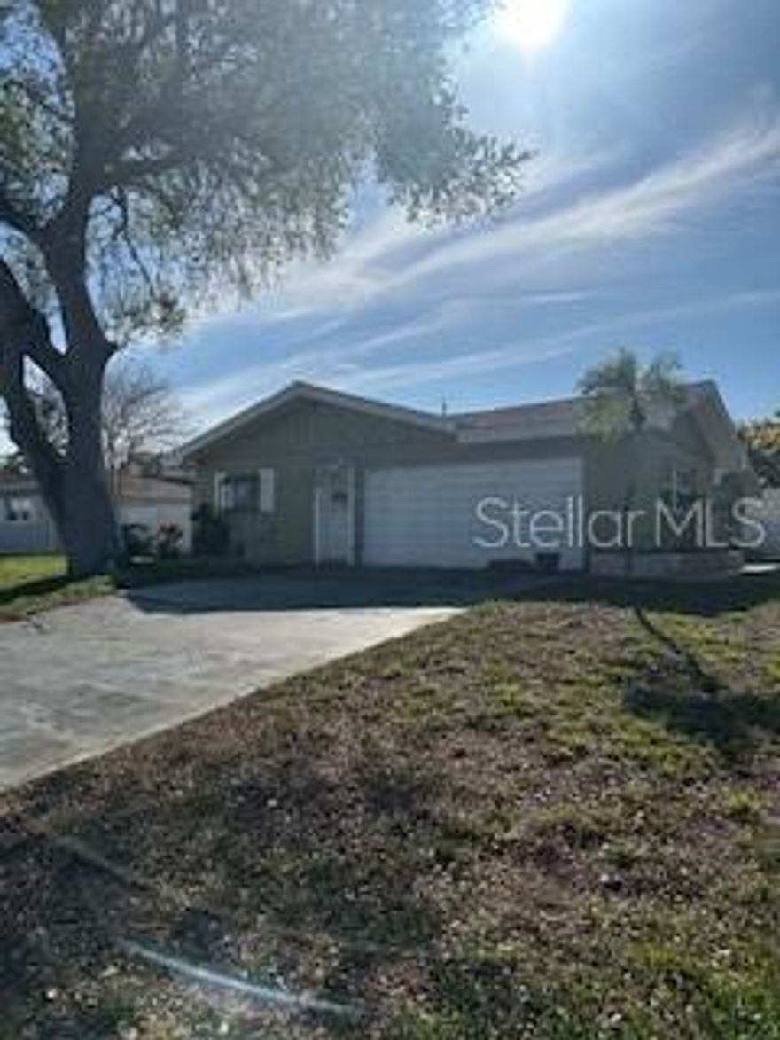 LARGE AND SPACIOUS 4 BED 3 BATH HOME READY TO OCCUPY. CORNER LOT WITH FENCED IN BACK YARD. HOME HAS A FORMAL LIVING ROOM AND FAMILY ROOM ALONG WITH AN ENCLOSED PORCH AREA THAT CAN BE USED AS AN OFFICE/PLAYROOM ETC. 4TH BEDROM IS A GRAGE CONVERSION ALONG WITH ITS OWN BATHROOM AND KITCHEN AREA WHICH COULD EASILY BE USED AS A MOTHER-IN-LAWSUITE AREA. LESS THAN A MILE FROM THE BELLEAIR BOAT RAMP AND GULF BEACHES. SHOPPING, DINING, AND BANKING ALL WITHIN 2 MINUTES DRIVE. MEDIUM PET OK.