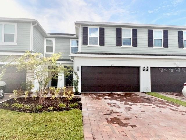 Come take a look at this 2 story 4 Bedroom 2.5 Bathroom 2 Car Garage Townhome. Living Room and Dining Combo. Kitchen with Granite Counter Tops and Stainless Steel Appliances. Appliances included are Stove, Microwave, Dishwasher, Refrigerator. Inside Utility Room with Washer and Dryer inlcuded. Tile & Carpet Throughout the home. Pets Ok and No Smoking. Lawn Care provided by the HOA. Community Features include a resort-style pool, splash pad, fenced playground, multi-sports field, picnic area, BBQ grills, and scenic walking trails. Just about 18-20 minutes to Disney. Year Built 2023 1868 Sqft.