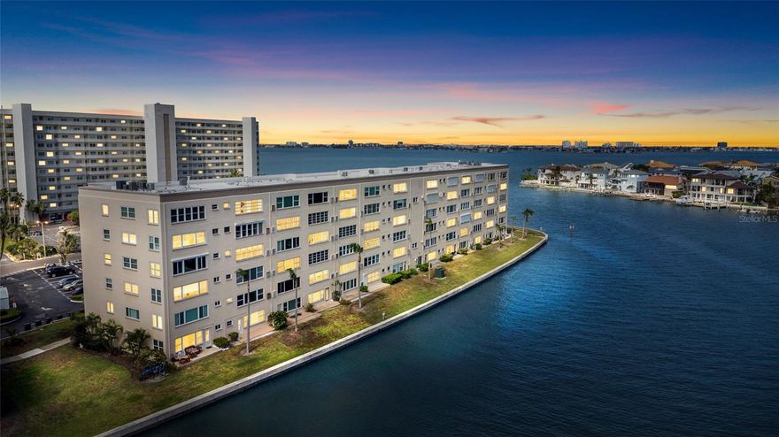 Turn-key waterfront living with open water views—fully furnished and ready from day one.

Enjoy easy coastal Florida living in this beautifully updated 2-bedroom, 2-bath second-floor END unit located in a desirable 55+ waterfront community on Boca Ciega Bay. With the nearby stairway for easy access, this residence offers both convenience and peace of mind—high and dry in a solid building which also does have elevator if required.

This light-filled condo features rare north and west-facing exposures, capturing expansive open water views, stunning sunsets, and even dolphin sightings from the living room, dining area, kitchen, and primary bedroom.

Conveniently offered fully furnished, this is a true move-in-ready opportunity—ideal for full-time living or a seasonal retreat. Nearly everything has been updated, including:

**All-new furniture, décor, window coverings, and carpets
**Two brand-new king beds with bedding and linens
**Updated kitchen with gas range and stainless appliances (2024)
**New TV, cookware, and kitchenware
**Fresh interior paint throughout
**New bedroom flooring, baseboards, closet doors, and fixtures
**PGT hurricane-impact windows 

The open floor plan flows seamlessly to a dining area with water views, while the primary suite offers a walk-in closet and peaceful waterfront setting. Guest bedroom includes generous storage and easy access to updated bath.

Major improvements already completed and paid for:

New A/C (2023)
New roof (2025)
New carport (2025)
Fresh exterior building paint

Covered parking included.

Residents enjoy resort-style amenities including multiple pools, tennis, pickleball, bocce, shuffleboard, boat docks, and a kayak launch. The monthly HOA covers gas (cooking, hot water, heating), water/sewer/trash, cable, internet, building insurance, reserves, exterior maintenance, roof, and landscaping.

Ideally located just minutes to Gulfport’s waterfront district, beaches, dining, and a short drive to St. Pete Beach and Tampa International Airport.

This is ready for immediate enjoyment. Schedule your showing today.
