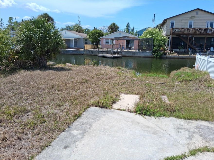 80 x 40 vacant land on a canal with direct access to the Gulf of America with no restrictions of bridges. There is city water and sewer to hook up, there used to be a home on this lot.