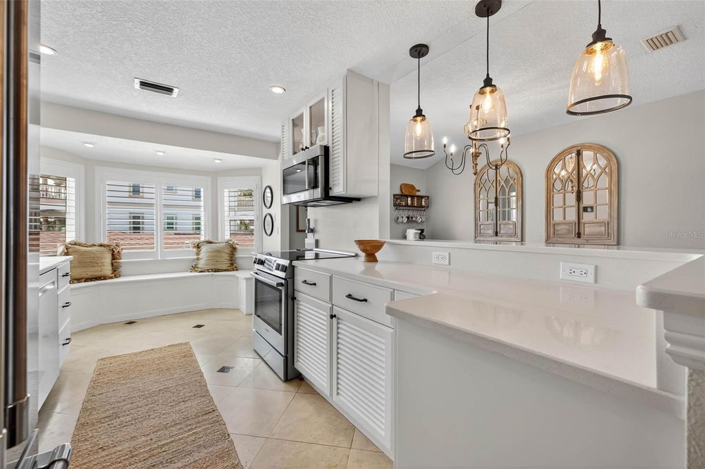 Photo of 2605 Hibiscus Drive W, Belleair Beach, FL 33786 (MLS # TB8441184)