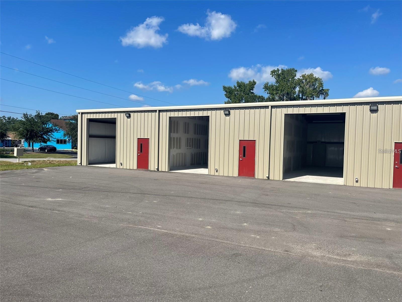 ** ONE MONTH FREE RENT ** Each warehouse boasts convenient roll-front bay doors, thoughtfully appointed offices, and modern bathroom facilities. Abundant parking space ensures hassle-free access for both employees and clients, while the prime highway frontage enhances visibility and connectivity. All commercial tenants are subject to a $100 non-refundable application fee.